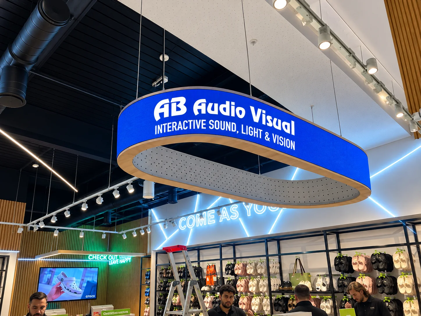 Curved suspended LED display in a retail showroom